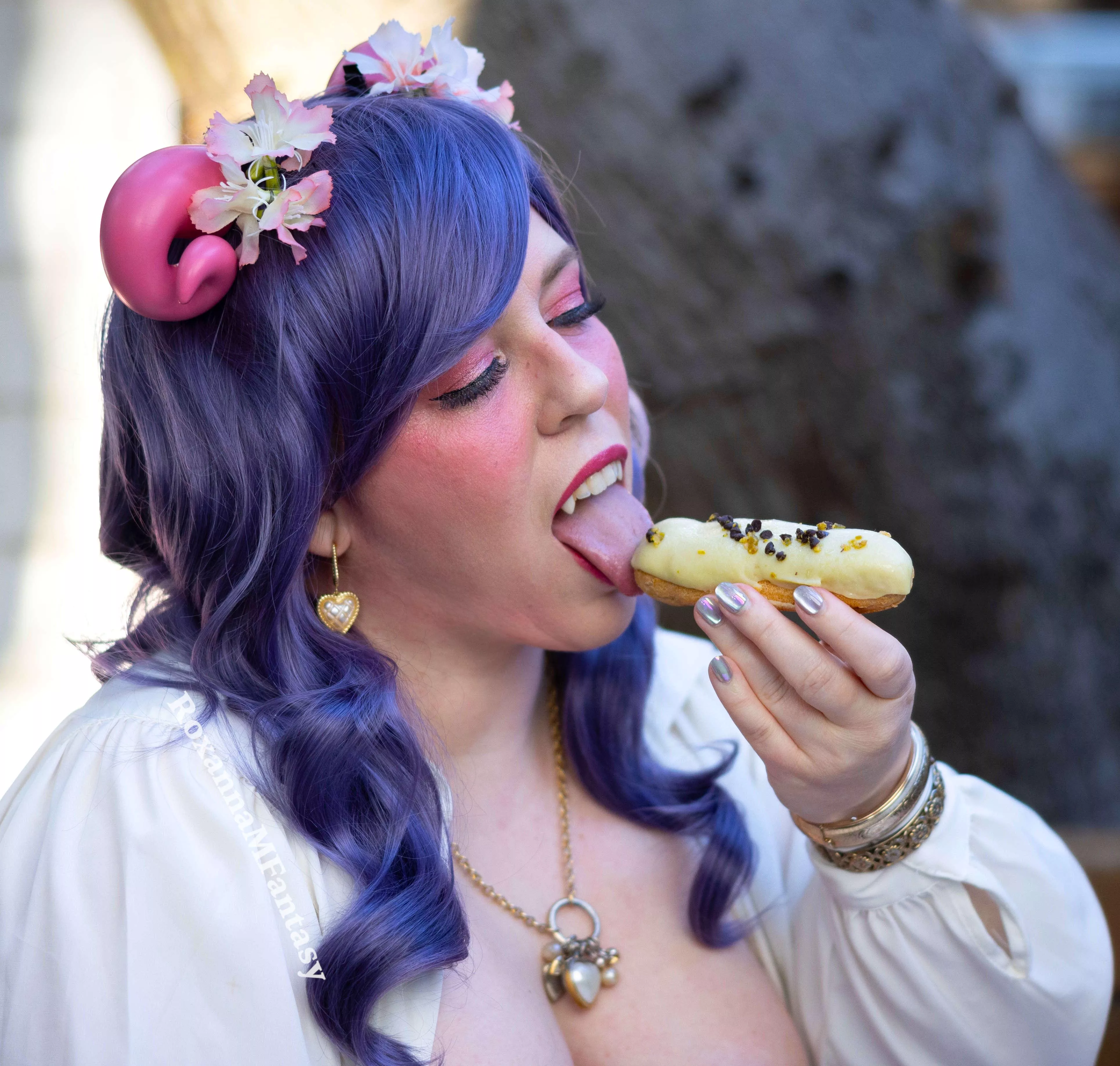 Would you risk a blow job with fangs? She'll tempt you to try...