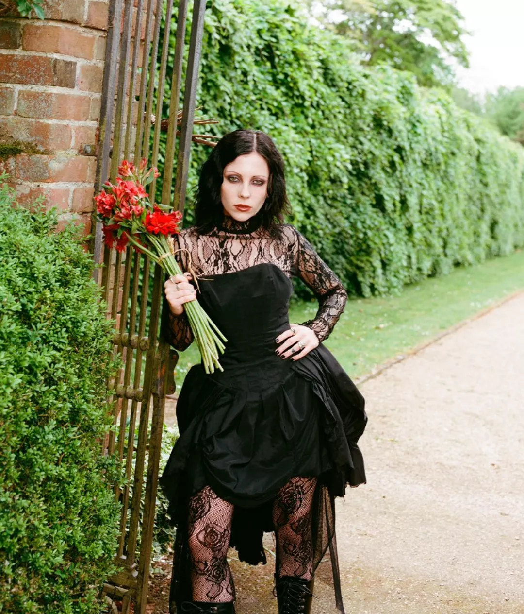 Heather Baron-Gracie (The Baroness) is about to brutally punish her servants for planting the wrong flowers in her castle garden.