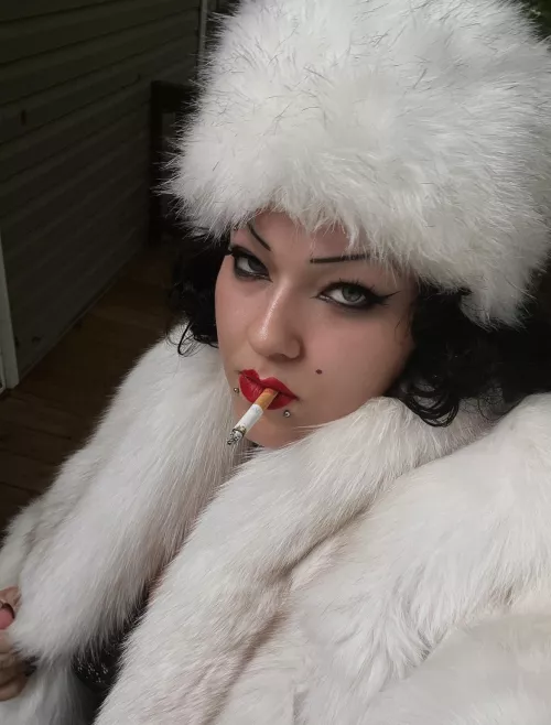 Countess smoking in full furs