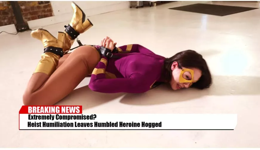 Superheroine is humiliated as her defeat is broadcast 