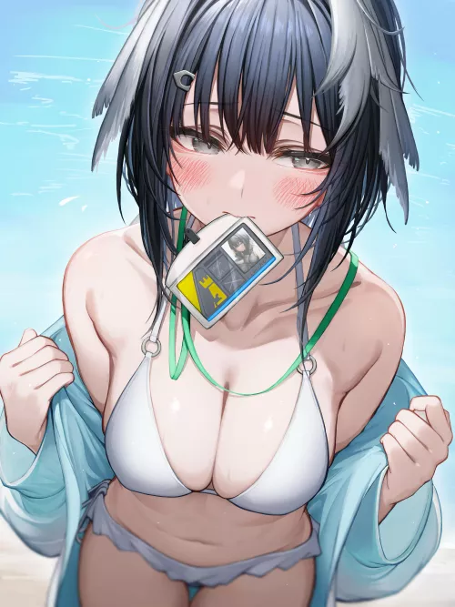 La Pluma showing her id card