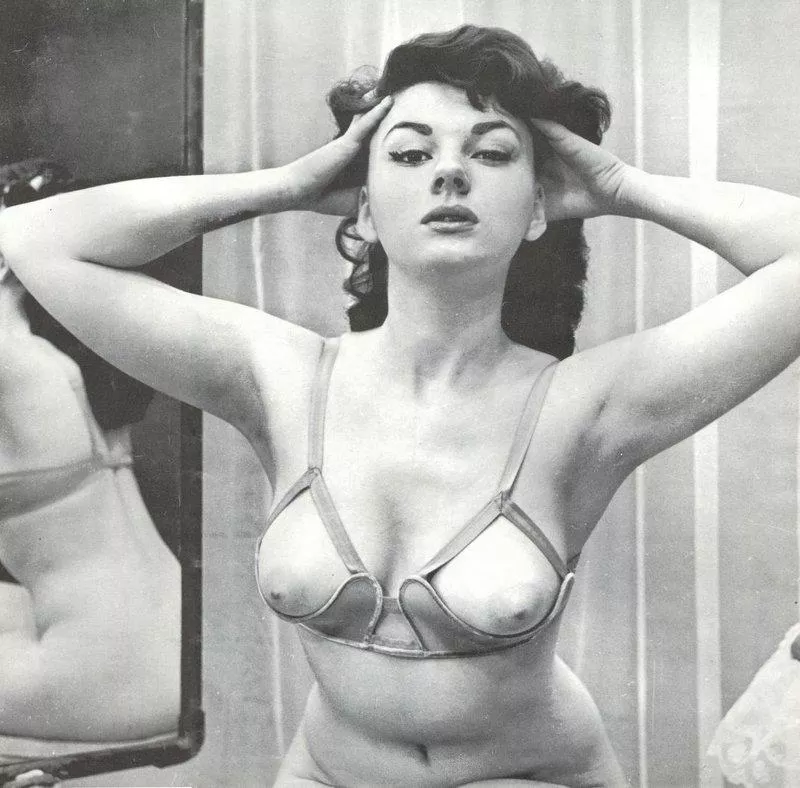 Glenda Graham tries on her special bra [1961]