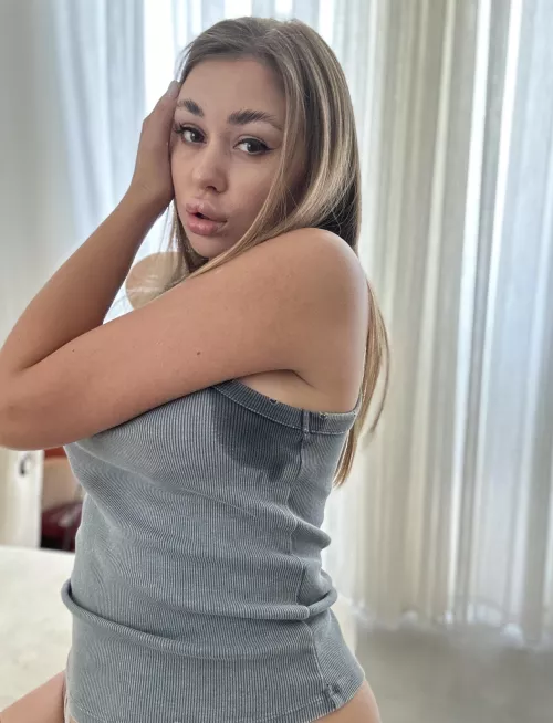 sweating because it's so hot in the room