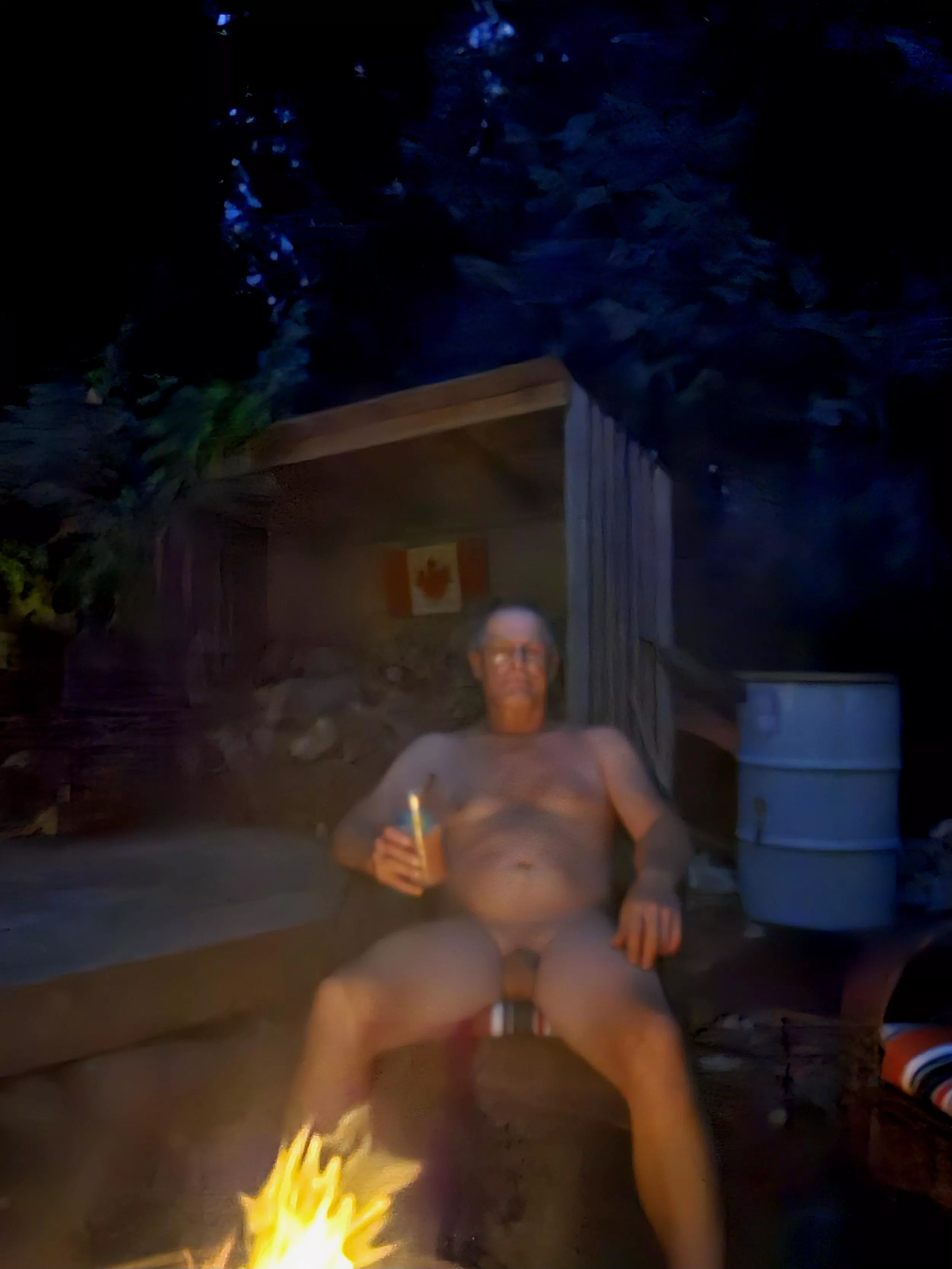 Enjoying a drink by the fire 