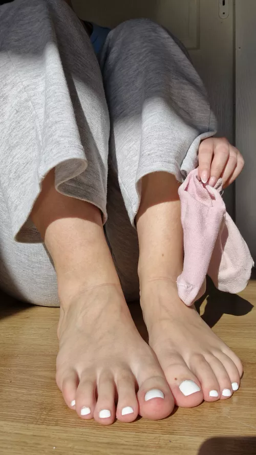 What caught your attention first? My white toes or my pink socks?