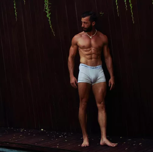 The abs are the main event, but those boxers are putting up a good fight!