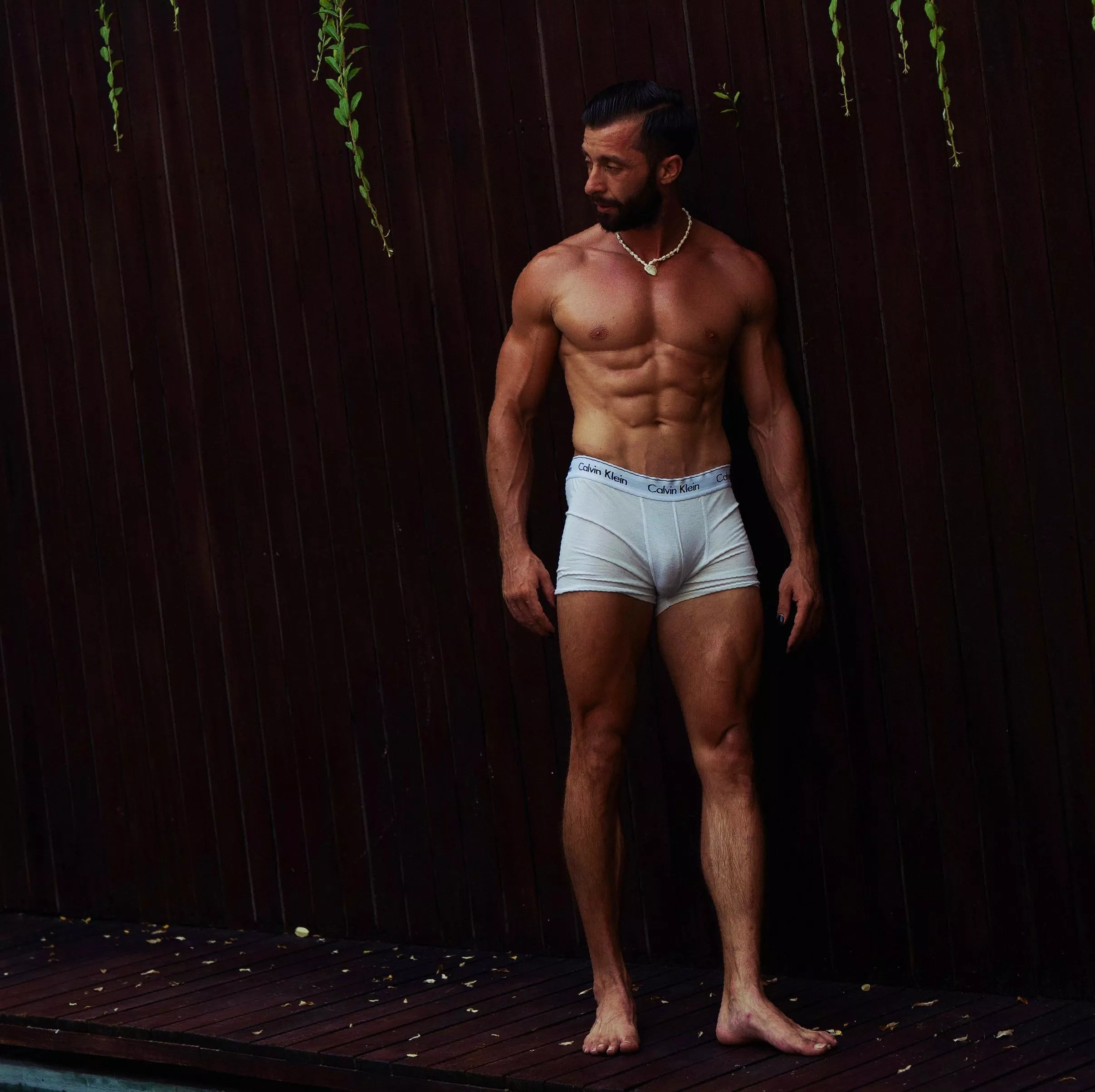 The abs are the main event, but those boxers are putting up a good fight!