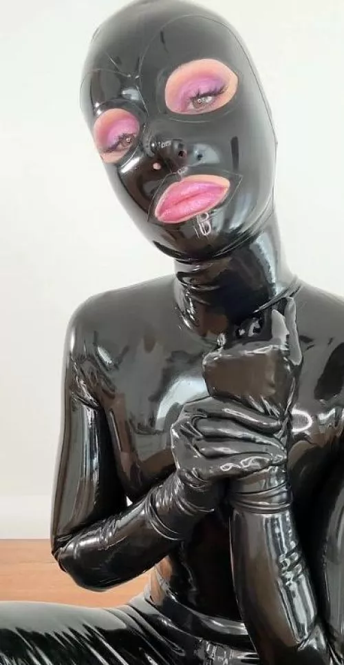 Covered in shiny latex