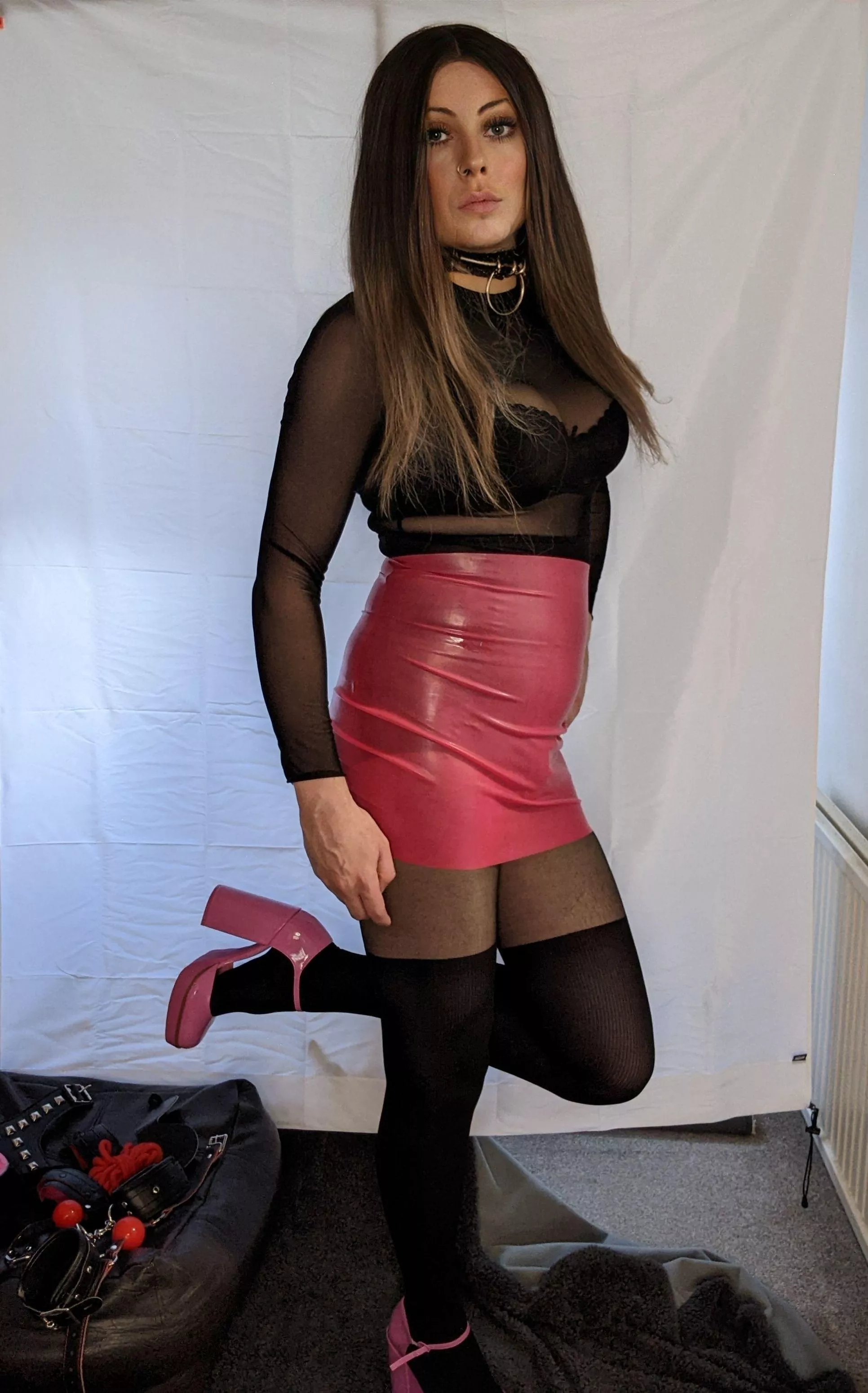 Legs for days in thigh high stockings.
