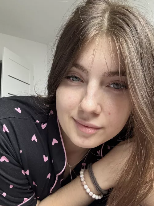 a real face of a 18 y.o. without makeup