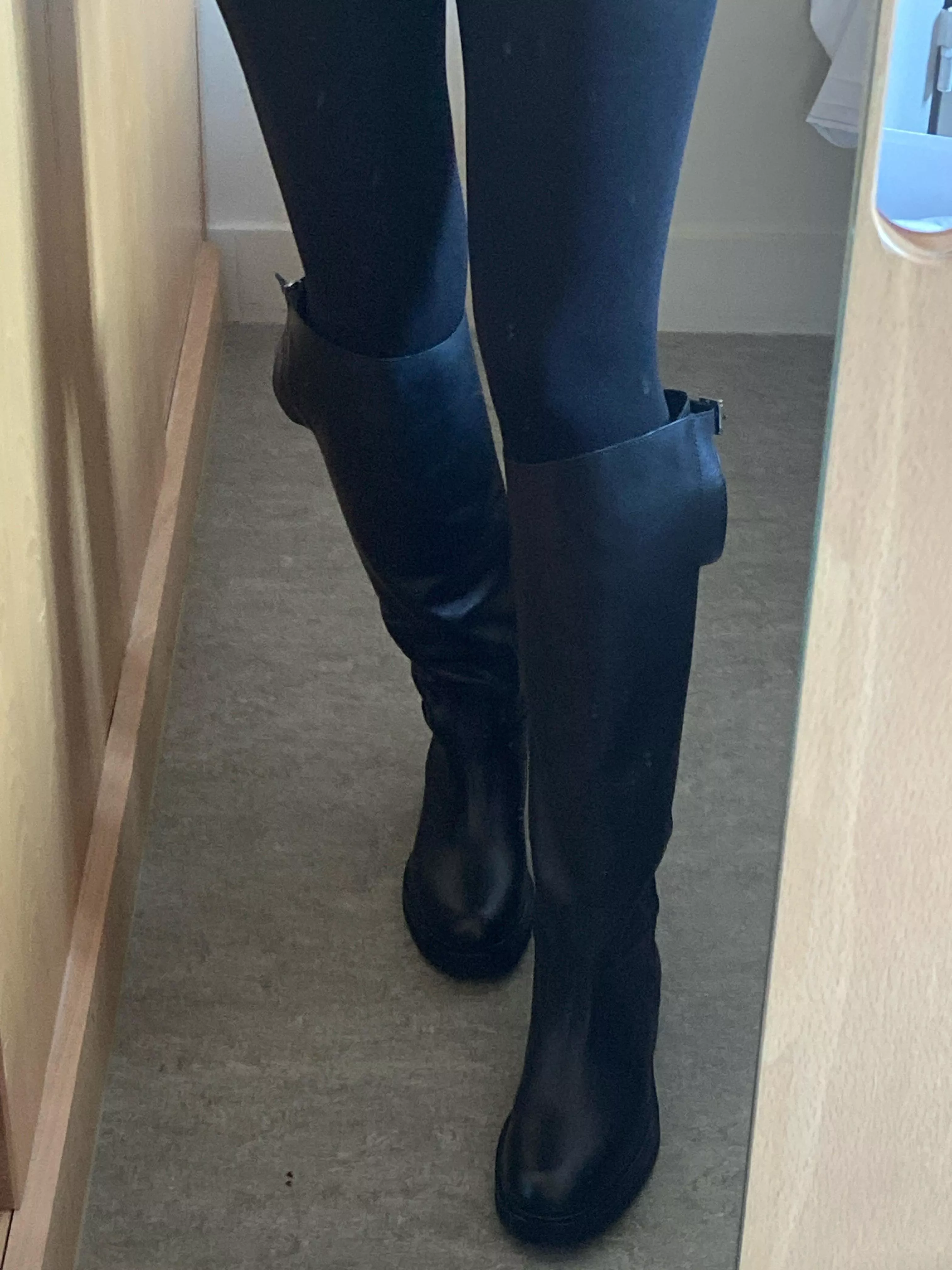 Do leather boots stretch out enough to fix the way these stick out on top? No matter how I adjust the buckle, the tabs stick out like ears. Am I better off returning for another style? 