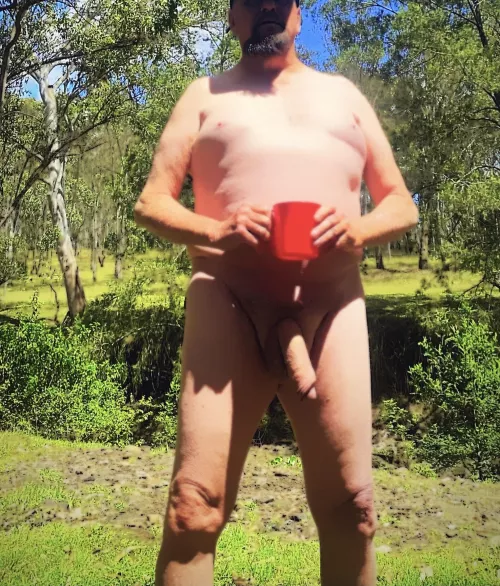 Enjoying a cup of coffee in the great outdoors.