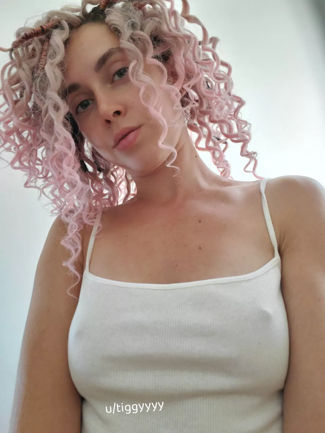 Extra obvious when going braless in a white tank top 🤭