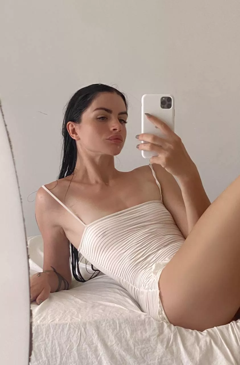 Look at this cute princess in a white dress. 