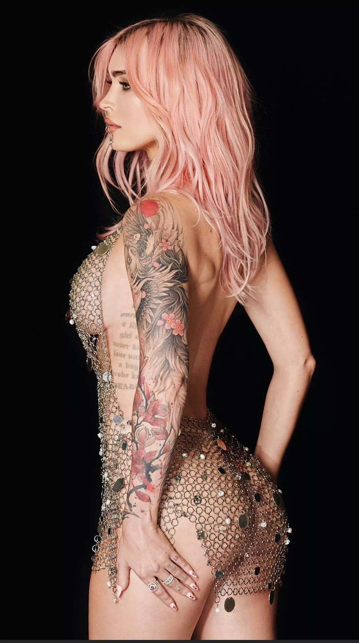 Megan Fox showing off her ass & sideboob in mesh minidress