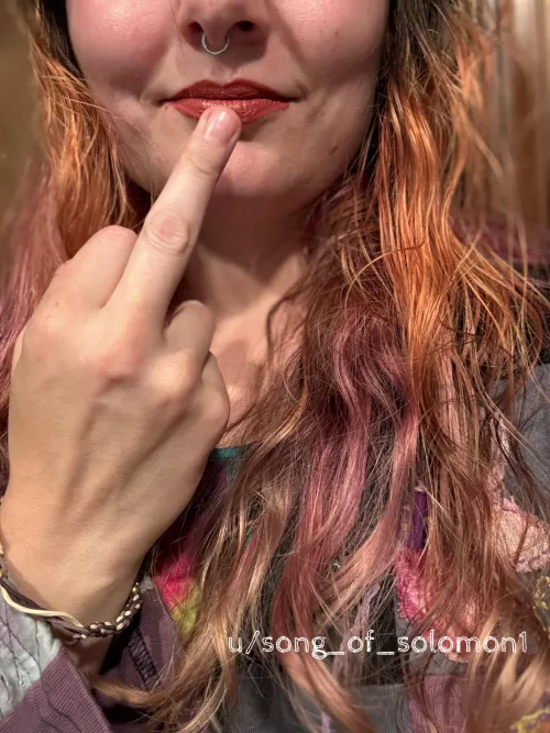 My finger and lips mocking your sad little wallet 