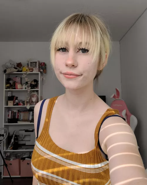 My hair's pulled back but I can assure your it's short ;D