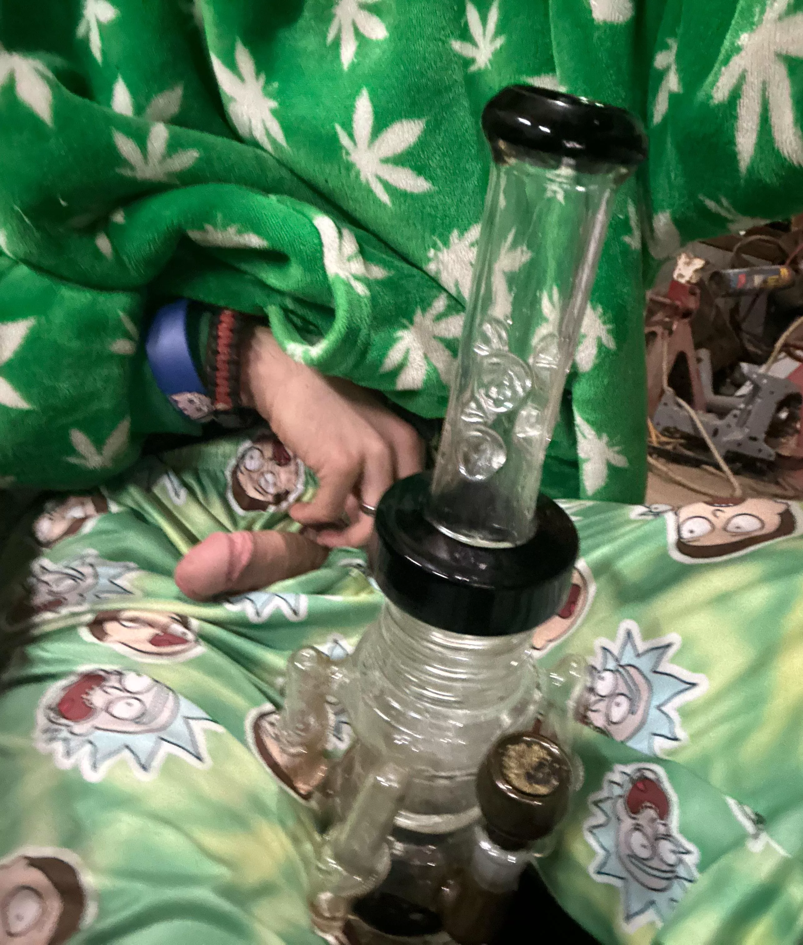 Smoking a few rips off the bong while someone wants to peek there head out heheh 