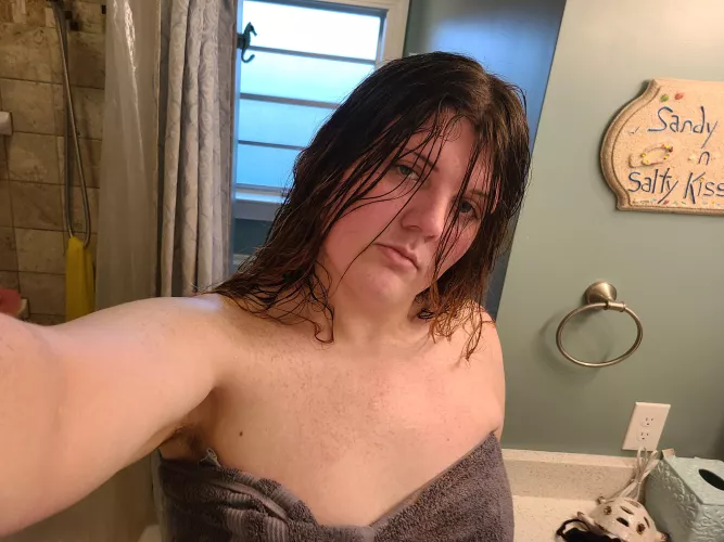 Who is trying to help me dry off after my shower?