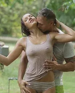 A kiss in the rain is very tempting..