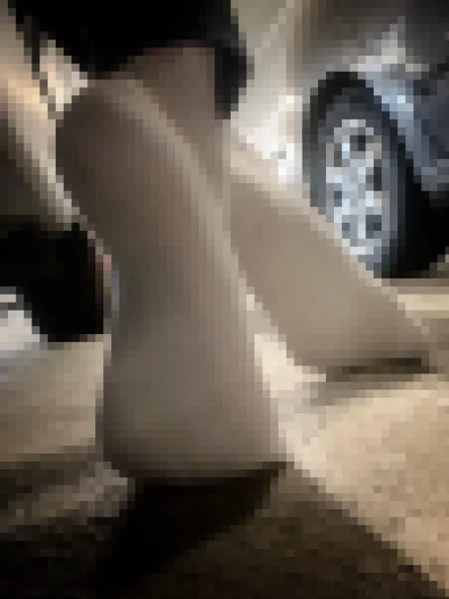 Day 8 of socktober 🤍 some white socks in a dirty parking garage 