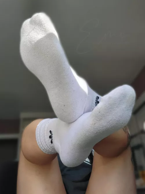 Dirty white gym socks with toe prints require immediate attention