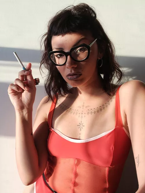 Get comfortable and watch a hot girl like me smoke 