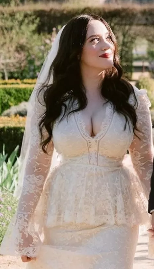 Goddamn even in her wedding dress she can't hide those milkers 
