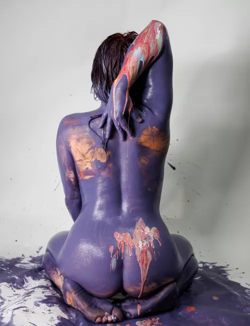 I was given the opportunity to be a canvas for a local artist. He did a few different paint pours on my body. This was one of my favorite shots. 