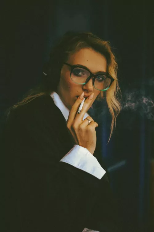 Let me finish smoking, and I will very obediently put your dick into my throat.