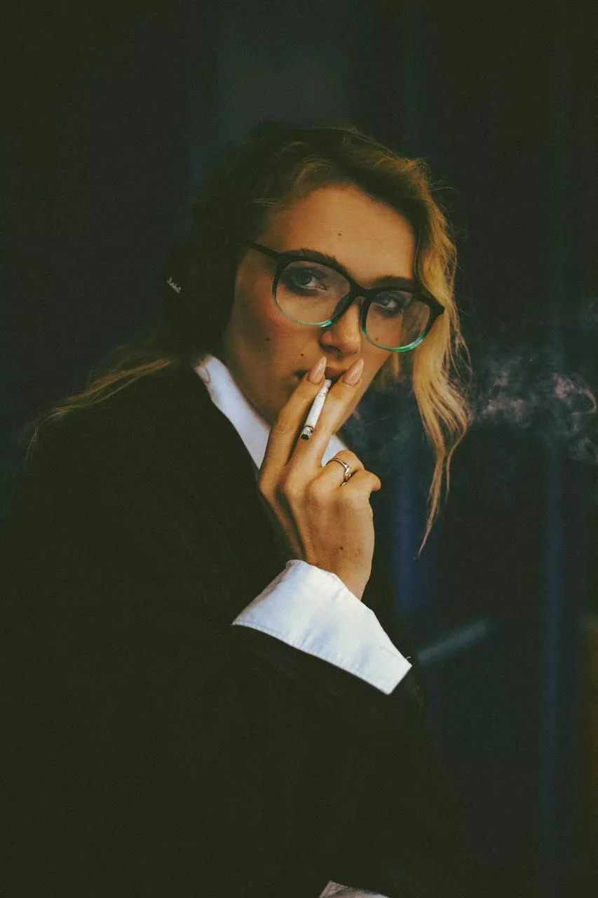 Let me finish smoking, and I will very obediently put your dick into my throat.