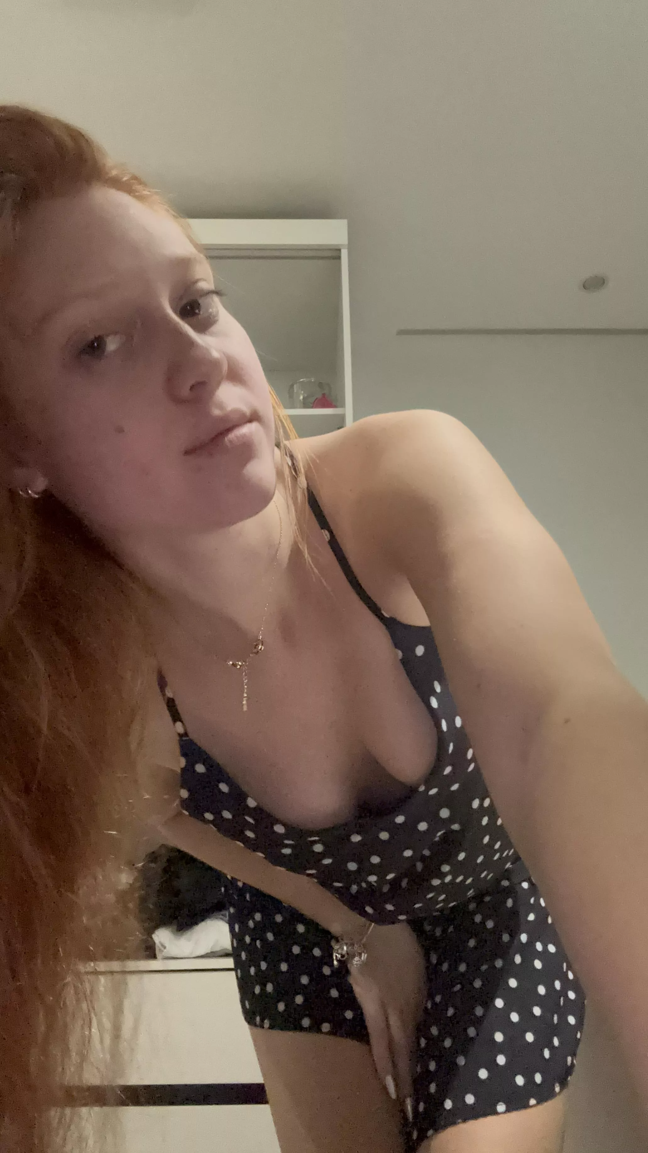 Lovin' the cleavage this redhead have,