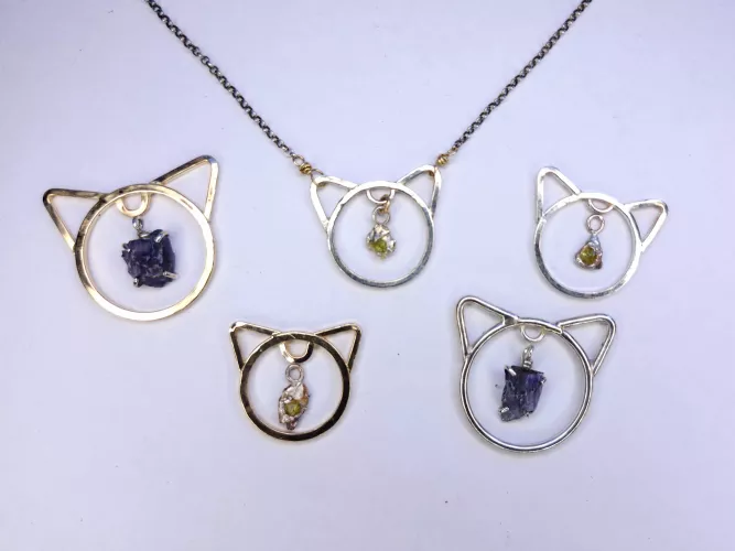making some kitten collars. Sterling Silver and 14k gf and the stones are hand mined here in BC! 