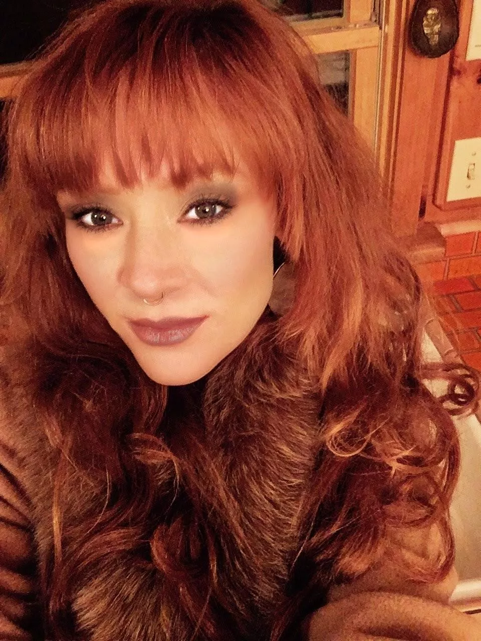 Nose ring looks good on her