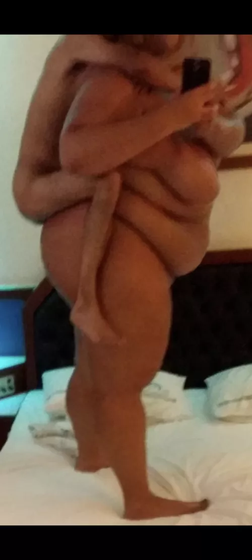 Piggy back. Small man riding big girl