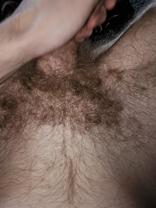Pumping my hairy dong while watching football.