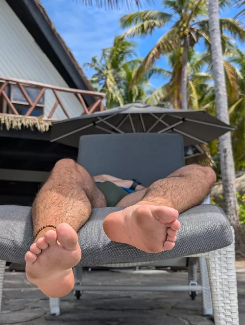 Relaxing on vacation, but you’re only here for my feet, aren’t you