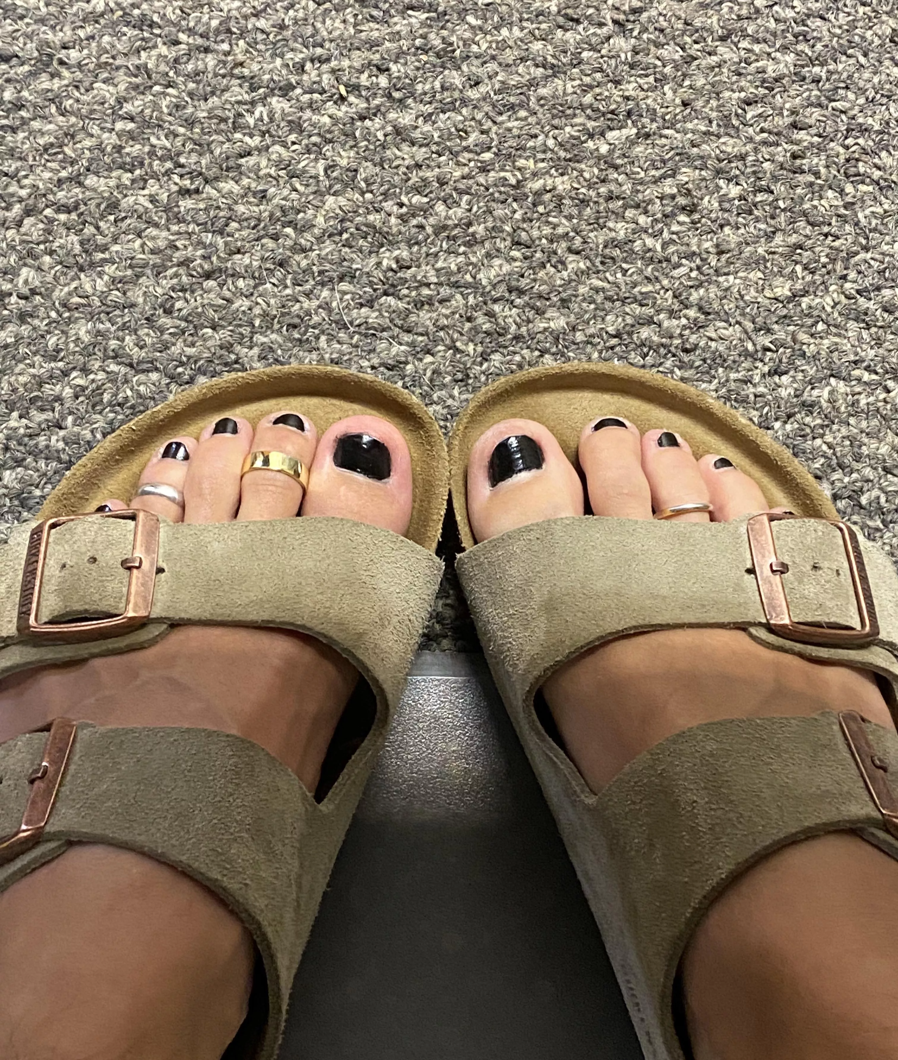Showing off my black toenails at work😅