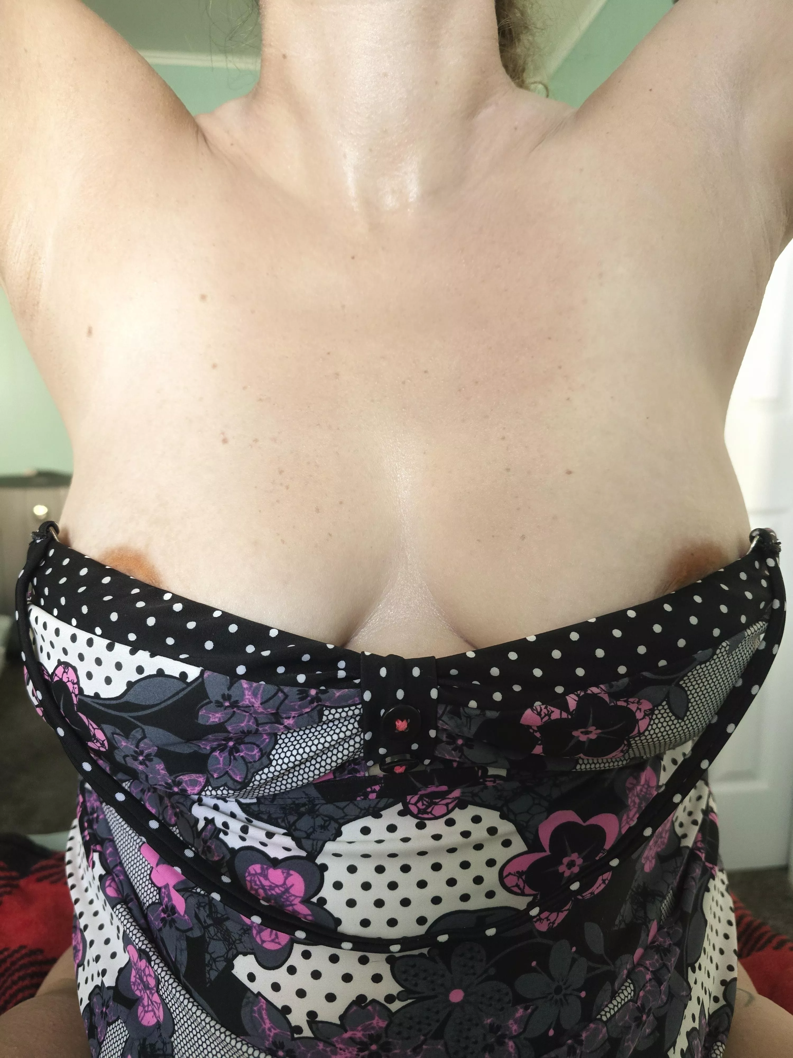 Sometimes my areolas slip out when I raise my arms. I hope you don't mind.