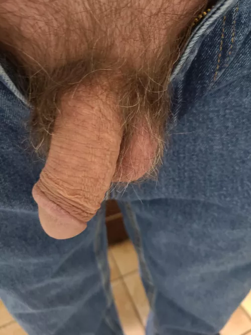 Unbuttoned and zipper down