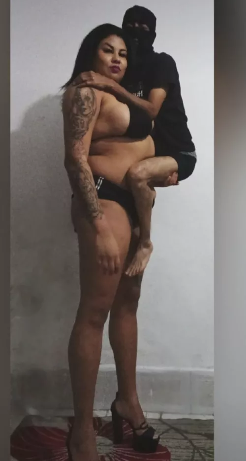 When a 20 year girl is more than thrice the size of a 40 year old man, you know she is one hell of a woman