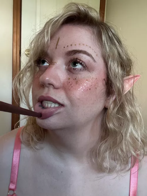 Can you make a riddle or a reason the party would need to find a word tattooed on an elf's lip?