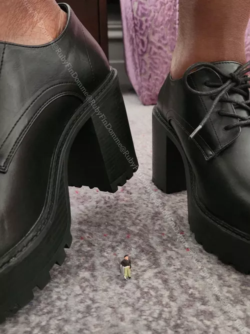 Crushing you under my towering heels... can you even handle it, tiny one?