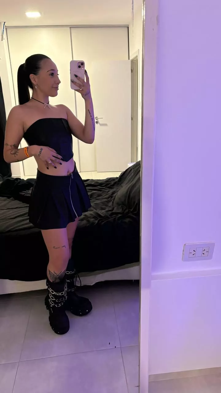 Just a regular girl trying on clothes in a changeroom...