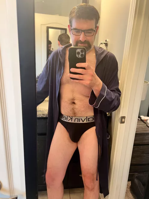 41 years of age.  Nothing more comfy than briefs and a robe 🙂