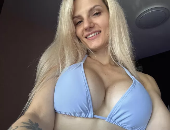 a stunning blonde teases you with her photos