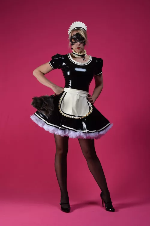A swish of the latex maid dress is so fun. 