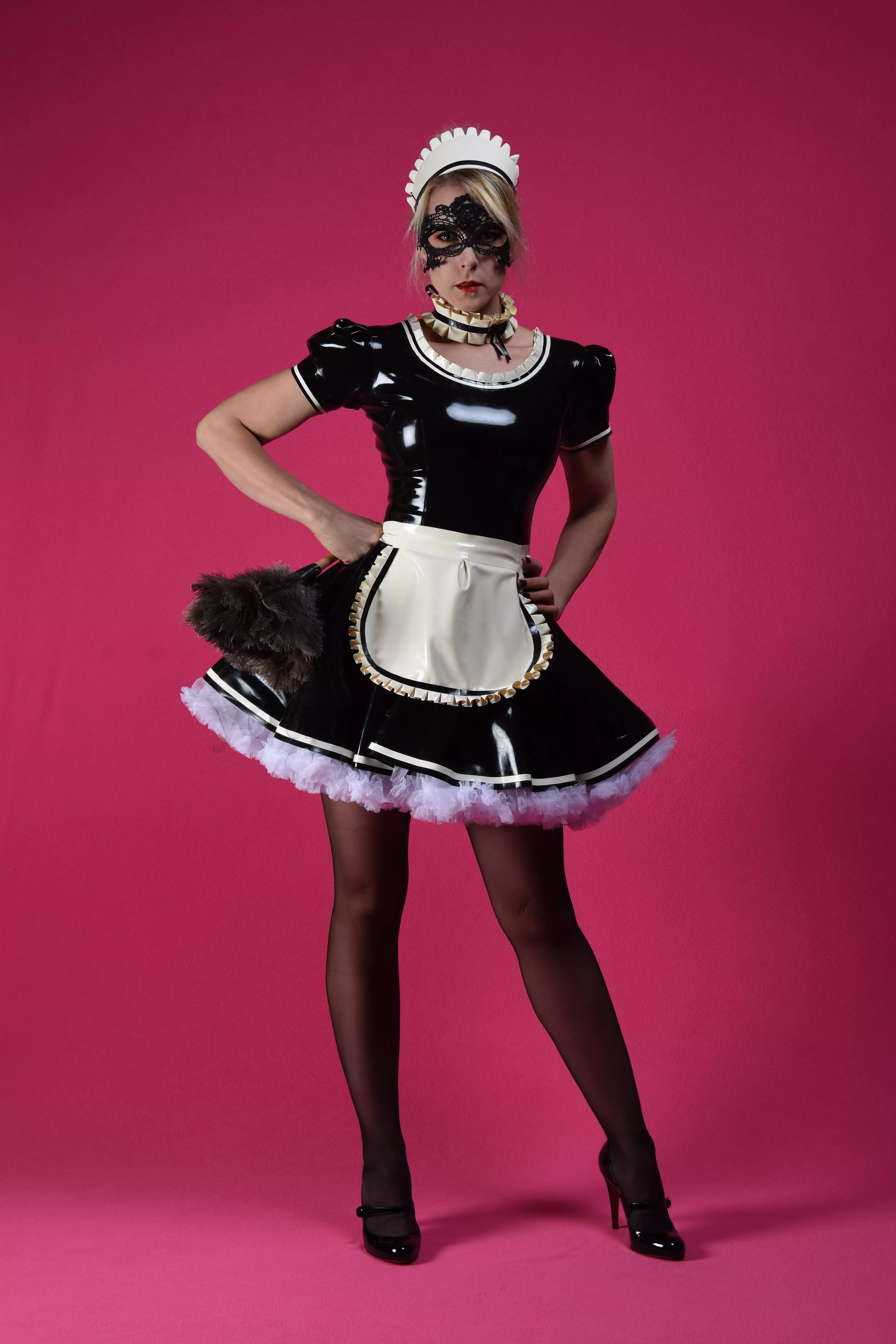 A swish of the latex maid dress is so fun. 