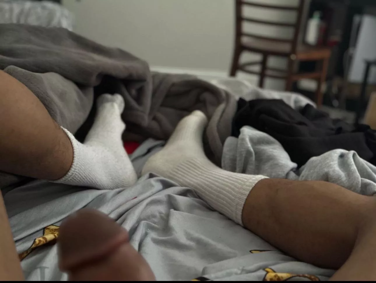 come on, give my big socked soles a good sniff 