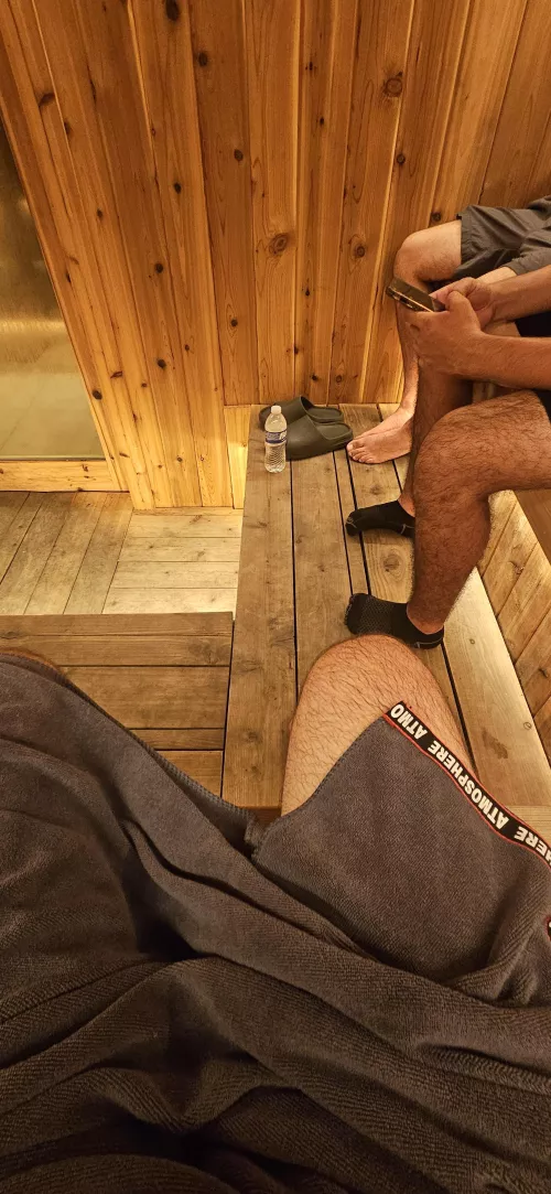 Hairy legs in the sauna